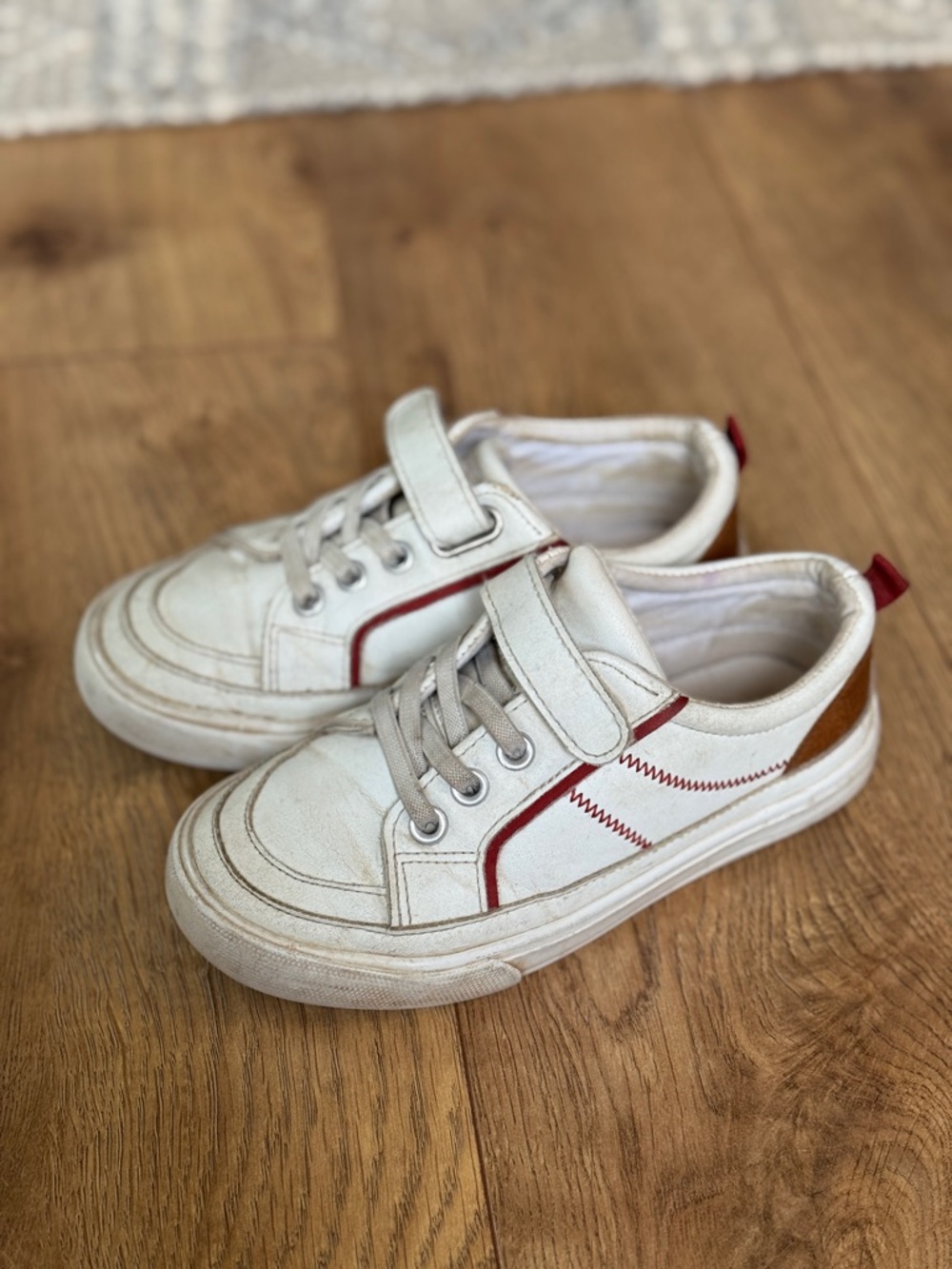 Kids White Sneakers, size 10. Baseball stitching.